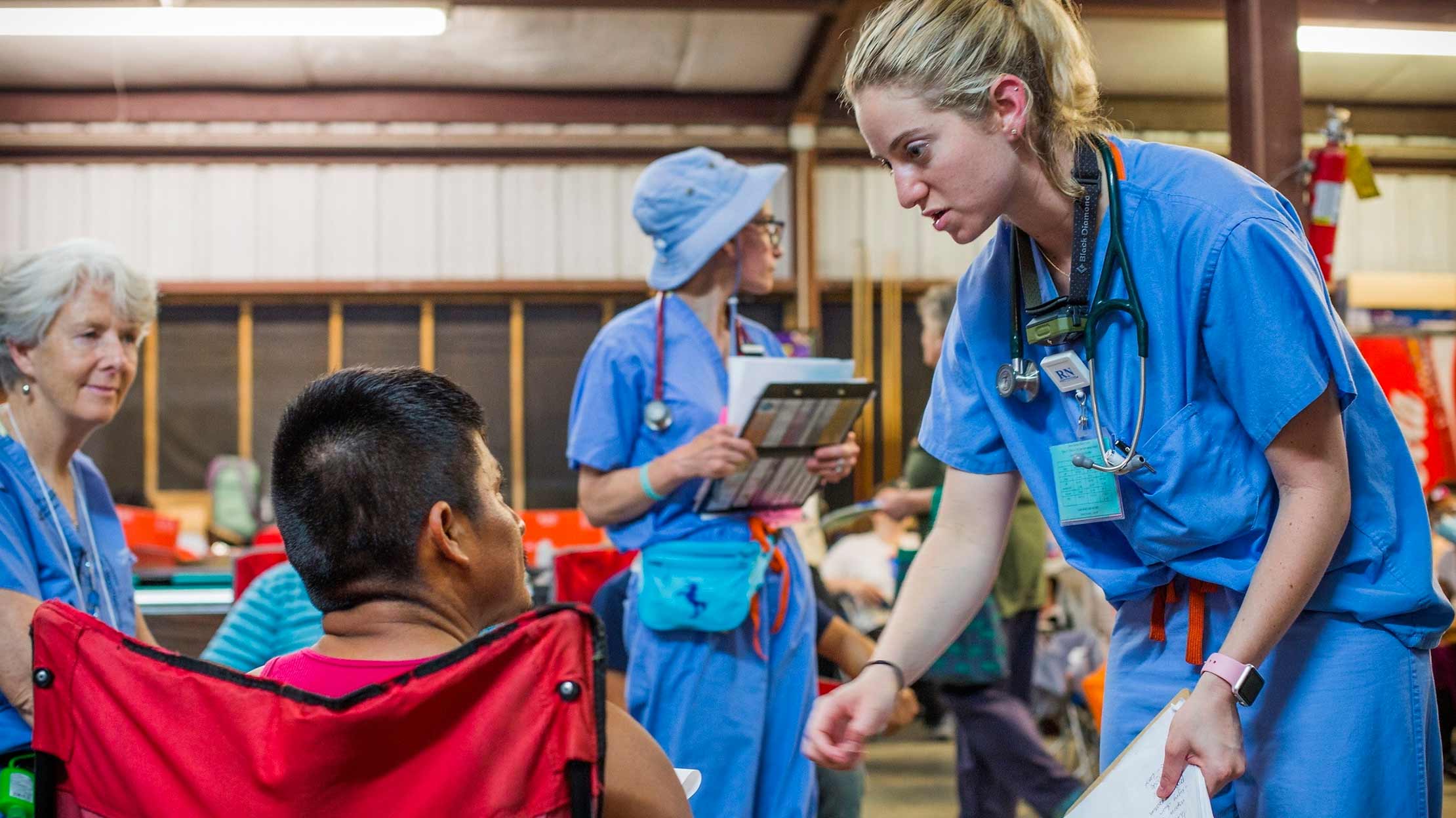 Medical staff treating a patient