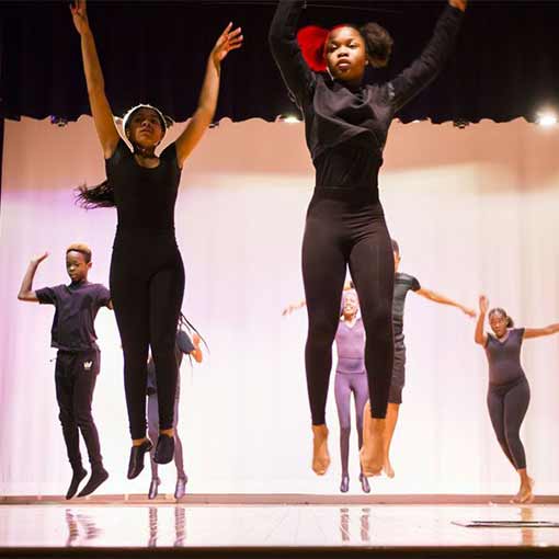 Student dancers on a stage