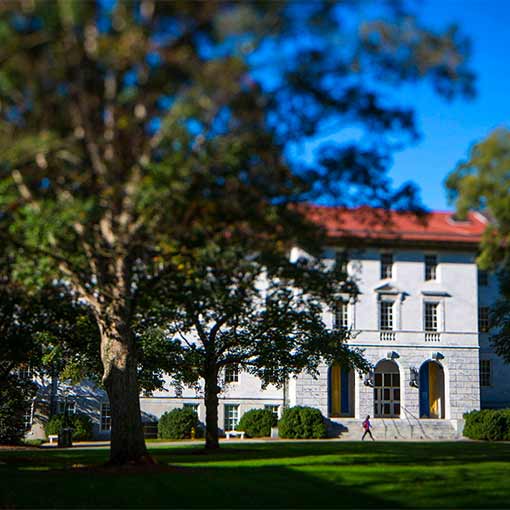 Photo of students walking in front of the administration building on the main Emory Quad